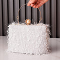 Isla – Abend-Clutch mit modischen Fransen und elegantem, strukturiertem Design