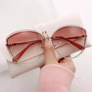 Eliana – Modische Cat-Eye-Sonnenbrille mit dunklen Gläsern und UV-Schutz