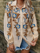 Isola – Elegantes Button-Up-Shirt mit Blumenmuster und Puffärmeln