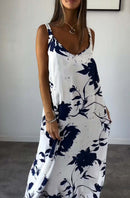Lelia – Stilvolles fließendes Kleid mit Blumenmuster Trägern und ohne Ärmel
