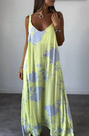 Lelia – Stilvolles fließendes Kleid mit Blumenmuster Trägern und ohne Ärmel