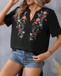 Laura - Elegante Bluse mit Blumenstickerei V Ausschnitt und kurzen Ärmeln