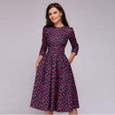 Tania - Lässiges mittellanges Kleid mit Rundhalsausschnitt Blumendruck und Taschen