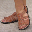Ines – Offene Sandalen mit floralen Akzenten und flüssiger Sohle