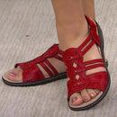 Ines – Offene Sandalen mit floralen Akzenten und flüssiger Sohle