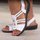 Ines – Offene Sandalen mit floralen Akzenten und flüssiger Sohle