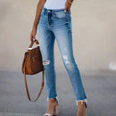 Melanie - Zerrissene Jeans mit schmaler Passform hohem Bund Knopf und Taschen